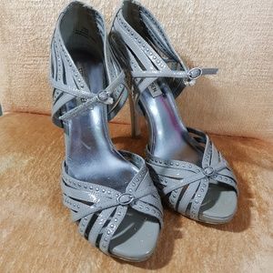 Grey pstent leather studded heel